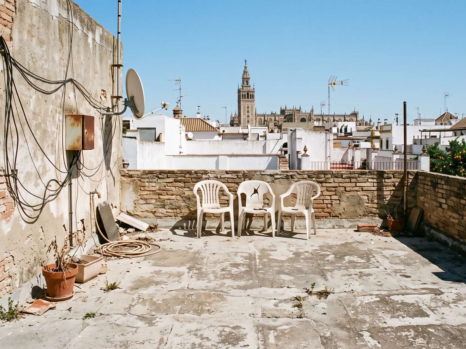 Terraza después de la reforma de confort exterior en Santa Cruz, Sevilla